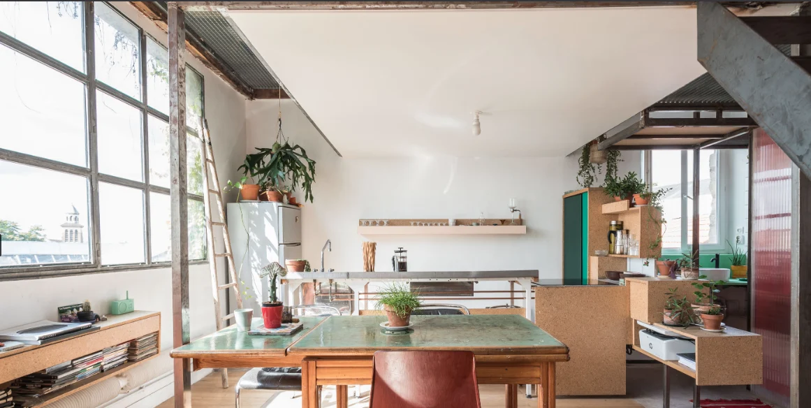 Architect’s loft with red structure and industrial glazing · 06