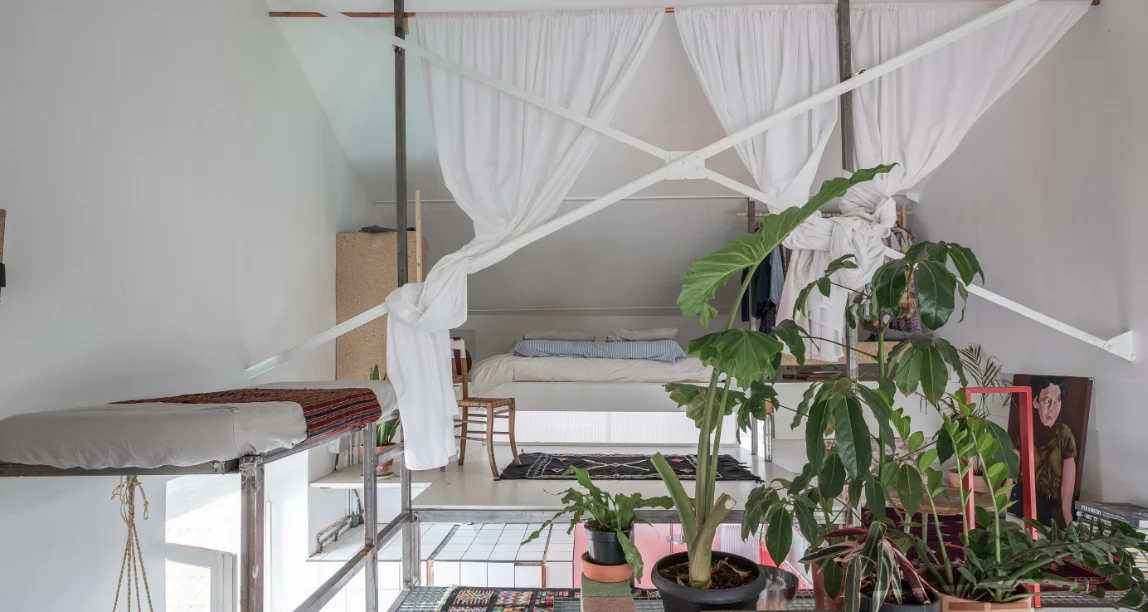 Architect’s loft with red structure and industrial glazing · 07