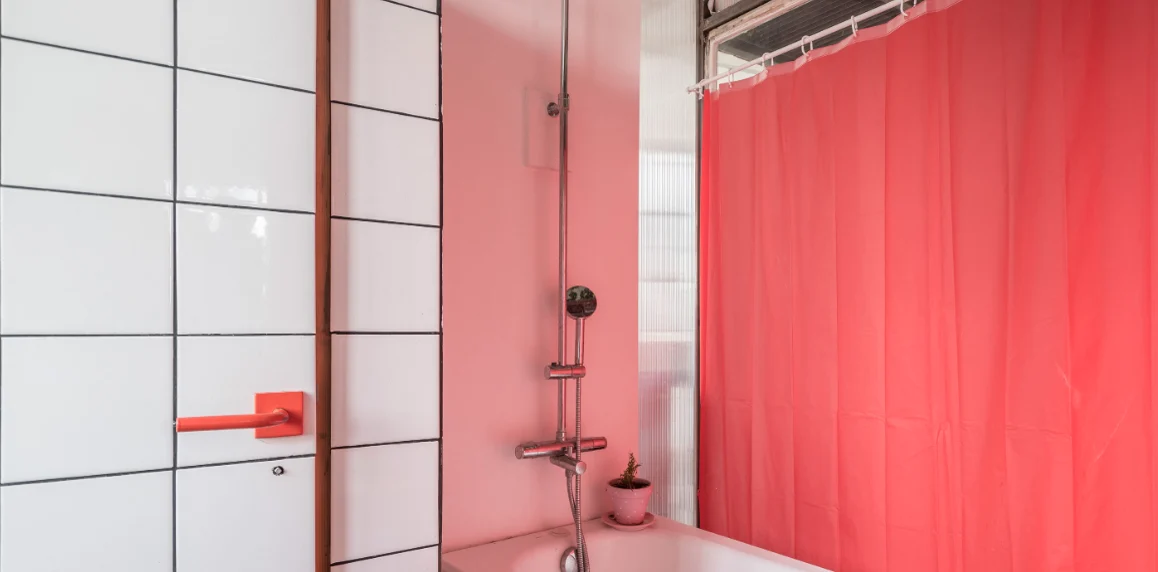Architect’s loft with red structure and industrial glazing · 10